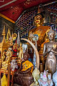 Chiang Mai - Wat Phra That Doi Suthep. The Buddha statues inside the Southern vihan. 